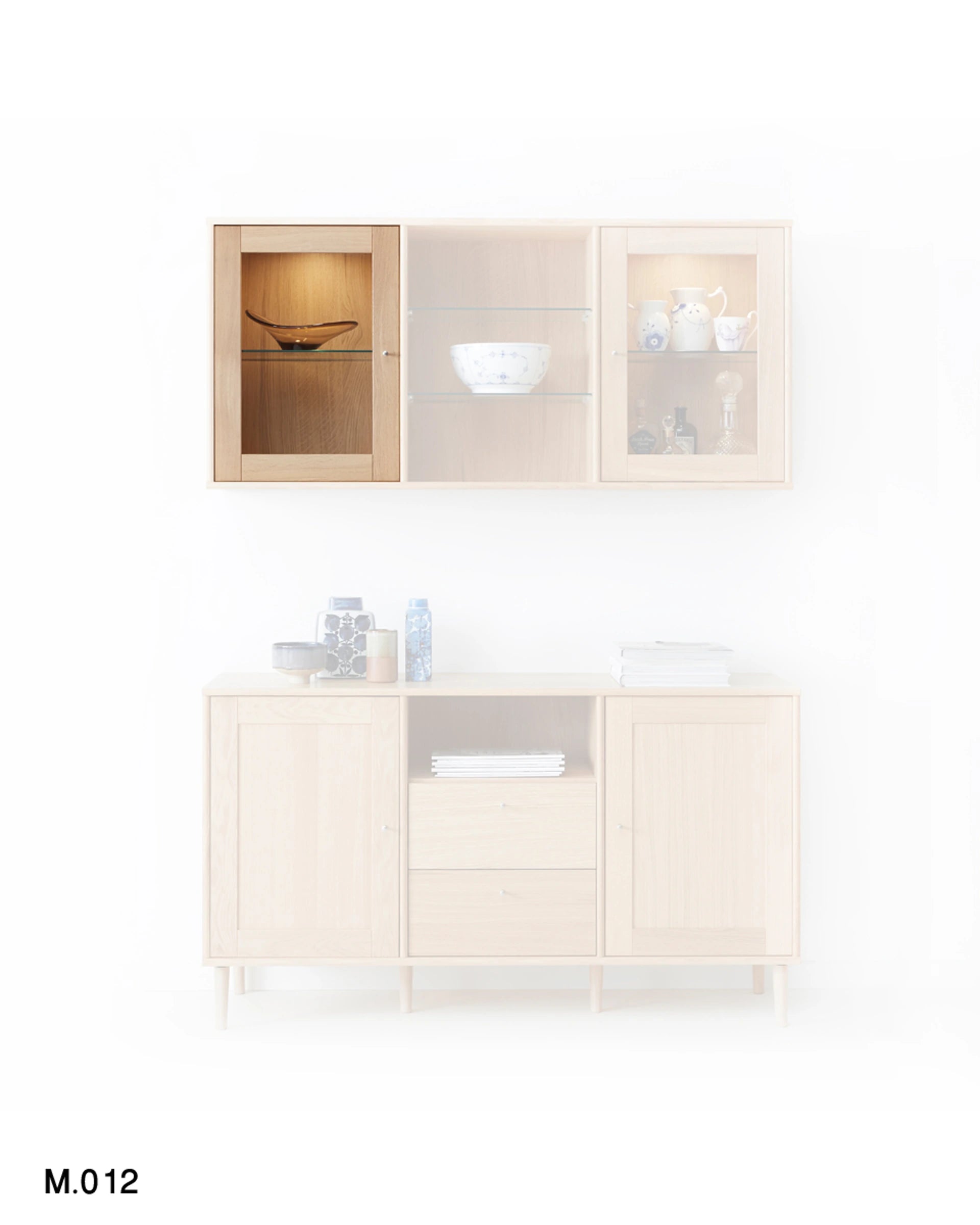 A light natural wood sideboard and matching wall-mounted display cabinet set, shown against a plain white background. The lower cabinet has doors, drawers, and open shelving, while the upper wall unit has three sections including glass-front cabinets displaying dishes.
