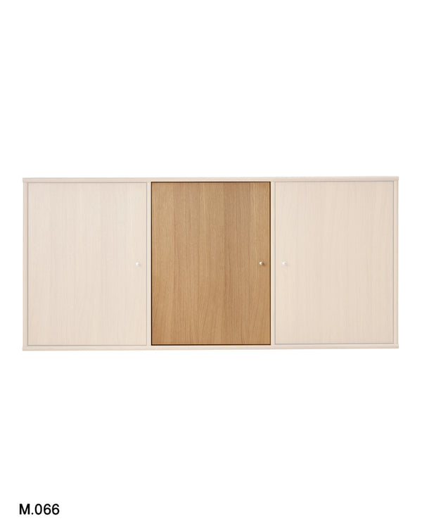 A three-panel sliding cabinet door set in light natural wood tones, shown against a plain white background with the model number M.066 in the bottom-left corner.