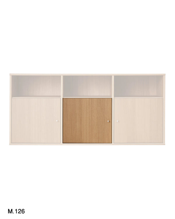 A modern wall-mounted storage cabinet with three open upper compartments and two lower sliding doors, shown against a plain white background. The cabinet features a light beige wood-grain finish on the outer panels and a central door in a slightly warmer tan wood tone.